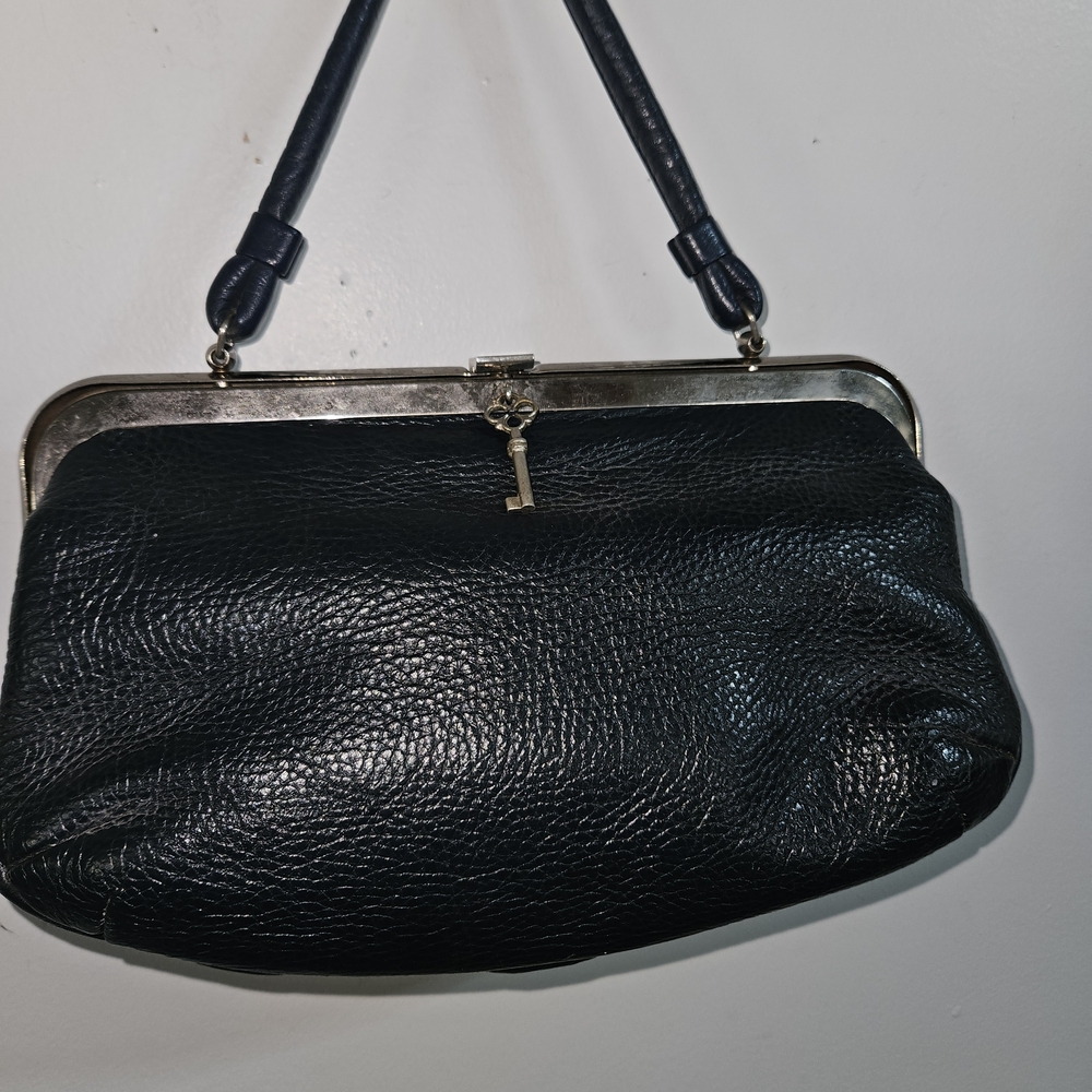 Elegant Black Leather 1960's Saber Bag